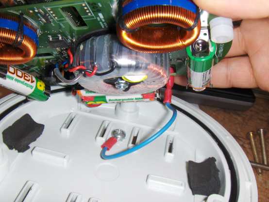 pm2000 circuit boards lifted slightly to show connection to the bottom of the enclosure